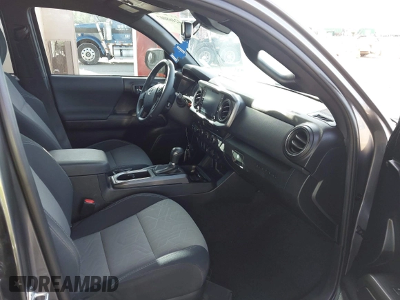 2021 Toyota Tacoma SR5 with VIN 5TFAZ5CN4MX113669, listed as a IAAI auction lot 42468007 with 29,368 mi miles and . Bid and sale history available at DreamBid. Image 5.