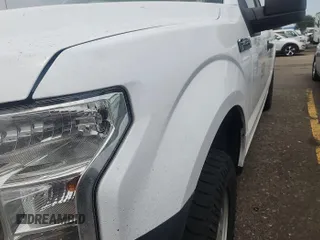2017 Ford F-150 XL with VIN 1FTEX1E82HKD27618, listed as a IAAI auction lot 42796140 with 124,457 mi miles and . Bid and sale history available at DreamBid. Image 1.
