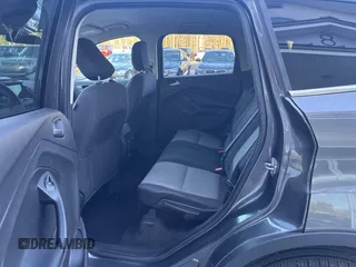 2018 Ford Escape SE with VIN 1FMCU9GD8JUA76991, listed as a IAAI auction lot 42013849 with 213,827 mi miles. Bid and sale history available at carsss.com. Image 8.