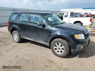 2010 Mazda Tribute Touring with VIN 4F2CY9C75AKM02945, listed as a Copart auction lot 67784674 with 134,363 mi miles and Salvage Title. Bid and sale history available at carsss.com. Image 4.