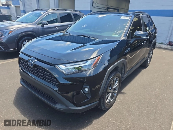 2022 Toyota RAV4 Hybrid XLE Premium z VIN 4T3B6RFVXNU071885, wystawiony jako IAAI lot #42730174 z przebiegiem 53 502 mil mil oraz . Historia ofert i sprzedaży dostępna na DreamBid. Obrazek 18.