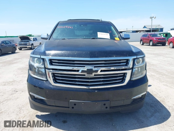 2015 Chevrolet Tahoe LTZ with VIN 1GNSCCKC4FR309152, listed as a IAAI auction lot 42029341 with 187,313 mi miles and . Bid and sale history available at DreamBid. Image 12.