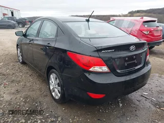 2013 Hyundai Accent GLS with VIN KMHCU4AE9DU379870, listed as a IAAI auction lot 41534029 with 102,610 mi miles. Bid and sale history available at carsss.com. Image 3.