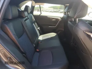 2023 Toyota RAV4 Hybrid XSE with VIN 2T3E6RFV9PW039963, listed as a Copart auction lot 57594335 with 27,486 mi miles and Salvage title. Bid and sale history available at DreamBid. Image 11.