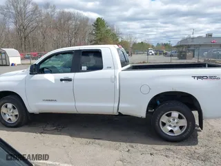 2013 Toyota Tundra 4WD Truck with VIN 5TFUM5F17DX045310, listed as a IAAI auction lot 42064531 with 158,237 mi miles. Bid and sale history available at carsss.com. Image 14.