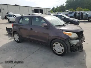 2011 Scion xD with VIN JTKKU4B41B1011289, listed as a Copart auction lot 57330875 with 79,926 mi miles and Salvage title. Bid and sale history available at DreamBid. Image 4.