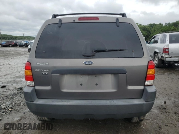 2003 Ford Escape XLT Popular 2 with VIN 1FMYU93163KE03257, listed as a Copart auction lot 66966644 with 209,618 mi miles and Salvage Title. Bid and sale history available at carsss.com. Image 6.