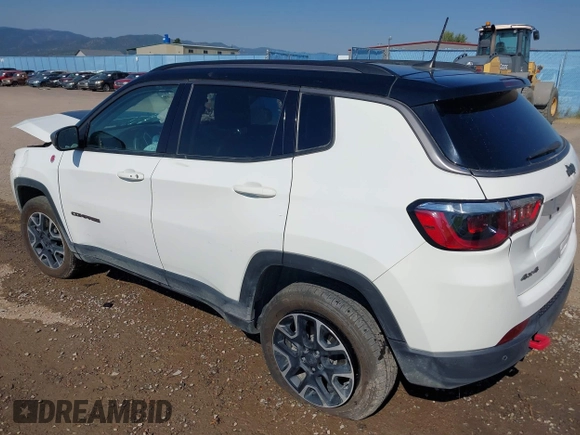 2021 Jeep Compass Trailhawk with VIN 3C4NJDDB0MT551172, listed as a IAAI auction lot 40155947 with 50,794 mi miles and . Bid and sale history available at DreamBid. Image 3.