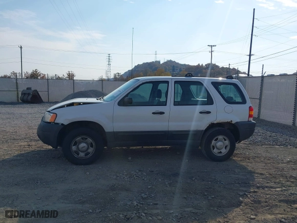 2003 Ford Escape XLS Popular with VIN 1FMYU92183KB46619, listed as a IAAI auction lot 40695244 with 0 mi miles. Bid and sale history available at carsss.com. Image 13.