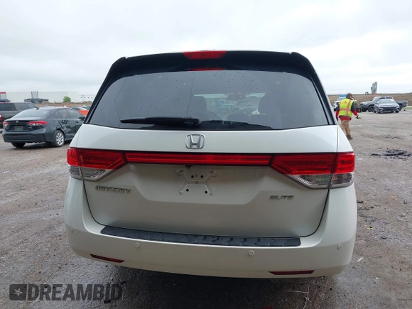 2014 Honda Odyssey Touring with VIN 5FNRL5H95EB059729, listed as a IAAI auction lot 42148110 with 135,304 mi miles and . Bid and sale history available at DreamBid. Image 17.