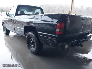 1996 Dodge Ram 1500 Work Special with VIN 1B7HC16X5TS698036, listed as a IAAI auction lot 41079518 with 220,948 mi miles. Bid and sale history available at carsss.com. Image 3.