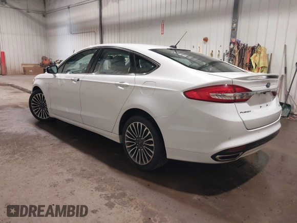 2017 Ford Fusion Titanium with VIN 3FA6P0K98HR124178, listed as a IAAI auction lot 42207938 with 89,352 mi miles and . Bid and sale history available at DreamBid. Image 3.