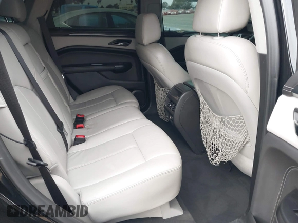 2015 Cadillac SRX with VIN 3GYFNAE37FS598023, listed as a IAAI auction lot 41198546 with 127,373 mi miles and . Bid and sale history available at carsss.com. Image 8.