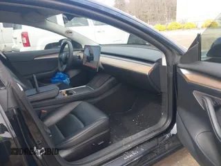 2022 Tesla Model 3 Long Range with VIN 5YJ3E1EBXNF177128, listed as a IAAI auction lot 41966089 with 75,140 mi miles and . Bid and sale history available at DreamBid. Image 5.