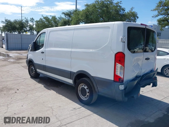 2015 Ford Transit Cargo with VIN 1FTNE1ZM2FKA78621, listed as a IAAI auction lot 41654632 with 234,709 mi miles and . Bid and sale history available at carsss.com. Image 3.