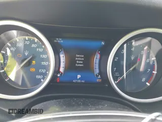 2017 Maserati Ghibli с VIN ZAM57XSA6H1218753, выставлен на аукционе IAAI как лот 41833235 с пробегом 42 135 миль миль и . История ставок и продаж доступна на DreamBid. Изображение 7.