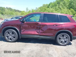 2019 Honda Passport EX-L with VIN 5FNYF7H59KB009956, listed as a IAAI auction lot 42021317 with 58,121 mi miles and . Bid and sale history available at DreamBid. Image 14.