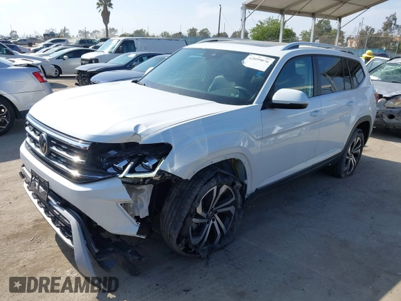 2023 Volkswagen Atlas SEL with VIN 1V2BR2CA7PC527099, listed as a IAAI auction lot 42099076 with 13,710 mi miles and . Bid and sale history available at DreamBid. Image 2.