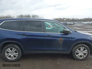 2016 Honda Pilot LX with VIN 5FNYF6H13GB061503, listed as a IAAI auction lot 42096651 with 226,785 mi miles. Bid and sale history available at carsss.com. Image 13.