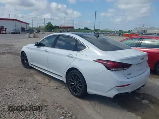 2018 Genesis G80 Sport with VIN KMHGN4JB5JU223891, listed as a IAAI auction lot 42559899 with 156,603 mi miles and . Bid and sale history available at DreamBid. Image 14.