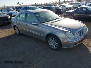 2005 Mercedes-Benz E-Class 3.2L with VIN WDBUF65J05A646577, listed as a IAAI auction lot 41666861 with 106,012 mi miles. Bid and sale history available at carsss.com. Image 1.