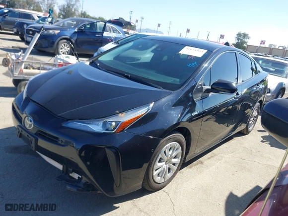 2021 Toyota Prius L Eco with VIN JTDKAMFU3M3148574, listed as a IAAI auction lot 41624303 with 89,747 mi miles. Bid and sale history available at carsss.com. Image 17.