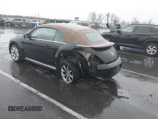 2013 Volkswagen Beetle 2.5L with VIN 3VW5P7AT8DM832656, listed as a IAAI auction lot 41729356 with 124,156 mi miles and . Bid and sale history available at DreamBid. Image 3.