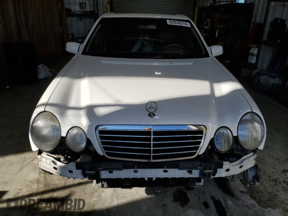2002 Mercedes-Benz E-Class with VIN WDBJF70J82B449047, listed as a Copart auction lot 82839314 with 170,710 mi miles and Salvage Title. Bid and sale history available at carsss.com. Image 5.