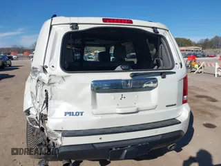2015 Honda Pilot Touring with VIN 5FNYF3H97FB023842, listed as a IAAI auction lot 41673881 with 106,110 mi miles. Bid and sale history available at carsss.com. Image 16.