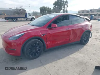 2023 Tesla Model Y Long Range with VIN 7SAYGAEE7PF713761, listed as a IAAI auction lot 41638067 with 46,089 mi miles and . Bid and sale history available at DreamBid. Image 20.