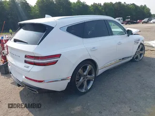 2022 Genesis GV80 with VIN KMUHCESC6NU084725, listed as a IAAI auction lot 42423446 with 66,562 mi miles and . Bid and sale history available at DreamBid. Image 4.