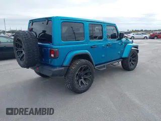 2020 Jeep Wrangler Unlimited Sahara with VIN 1C4HJXEN6LW231189, listed as a IAAI auction lot 41395059 with 59,399 mi miles. Bid and sale history available at carsss.com. Image 4.