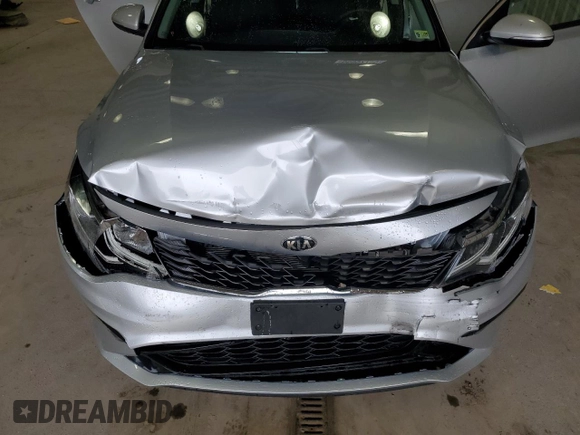 2019 Kia Optima LX z VIN 5XXGT4L39KG296057, wystawiony jako Copart lot #56992715 z przebiegiem 67 842 mil mil oraz Szkoda całkowita • Salvage title. Historia ofert i sprzedaży dostępna na DreamBid. Obrazek 11.
