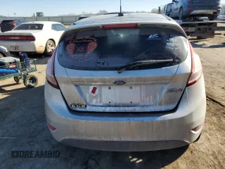 2016 Ford Fiesta S z VIN 3FADP4TJ0GM120600, wystawiony jako Copart lot #42301475 z przebiegiem Nie podano mil oraz Szkoda całkowita • Salvage title. Historia ofert i sprzedaży dostępna na DreamBid. Obrazek 6.