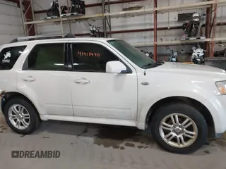 2009 Mercury Mariner Premier with VIN 4M2CU97729KJ00086, listed as a IAAI auction lot 41418490 with 167,486 mi miles. Bid and sale history available at carsss.com. Image 13.
