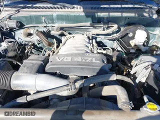 2004 Toyota Tundra SR5 with VIN 5TBRT34114S448987, listed as a IAAI auction lot 41763720 with 228,203 mi miles. Bid and sale history available at carsss.com. Image 10.