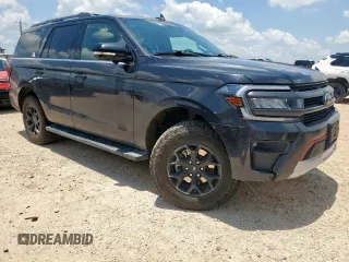 2022 Ford Expedition Timberline with VIN 1FMJU1RT5NEA18012, listed as a Copart auction lot 61226845 with 105,464 mi miles and Salvage title. Bid and sale history available at DreamBid. Image 4.