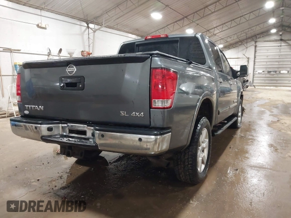 2014 Nissan Titan S with VIN 1N6AA0EC6EN513801, listed as a IAAI auction lot 41762295 with 128,412 mi miles and . Bid and sale history available at DreamBid. Image 4.
