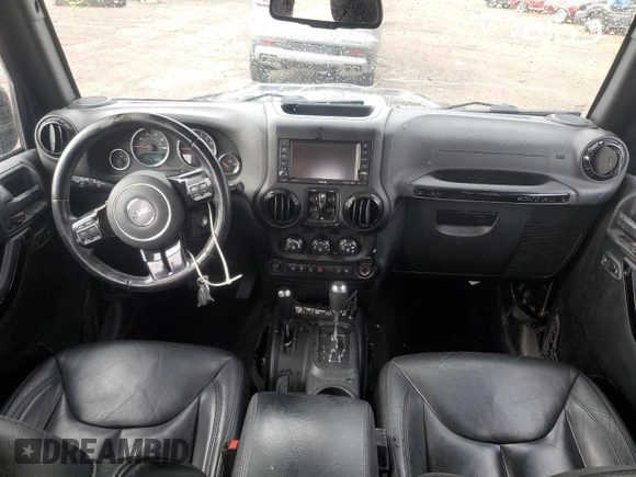2015 Jeep Wrangler Unlimited Altitude with VIN 1C4HJWEG1FL703736, listed as a Copart auction lot 78448254 with 148,264 mi miles and Clean title. Bid and sale history available at DreamBid. Image 8.