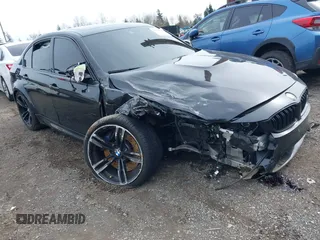 2015 BMW M3 z VIN WBS3C9C55FP803198, wystawiony jako IAAI lot #41778014 z przebiegiem 45 367 mil mil oraz . Historia ofert i sprzedaży dostępna na DreamBid. Obrazek 1.