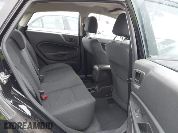 2017 Ford Fiesta SE z VIN 3FADP4BJ7HM145271, wystawiony jako IAAI lot #42056576 z przebiegiem 128 847 mil mil oraz . Historia ofert i sprzedaży dostępna na DreamBid. Obrazek 8.