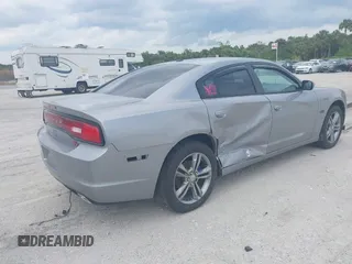 2014 Dodge Charger RT Plus with VIN 2C3CDXDT7EH159703, listed as a IAAI auction lot 41763606 with 132,333 mi miles. Bid and sale history available at carsss.com. Image 4.
