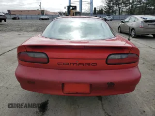 1995 Chevrolet Camaro z VIN 2G1FP22S1S2181409, wystawiony jako Copart lot #49273555 z przebiegiem 112 589 mil mil oraz Czysty tytuł • Clean title. Historia ofert i sprzedaży dostępna na DreamBid. Obrazek 6.