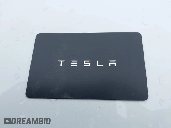 2023 Tesla Model Y Long Range with VIN 7SAYGDEE7PF809164, listed as a IAAI auction lot 41828974 with 31,772 mi miles. Bid and sale history available at carsss.com. Image 11.