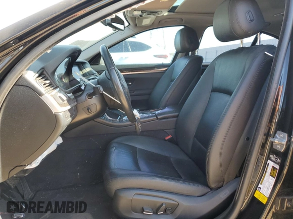 2014 BMW 5 Series 535d with VIN WBAXA5C51ED690385, listed as a Copart auction lot 57290645 with 161,694 mi miles and Salvage title. Bid and sale history available at DreamBid. Image 7.