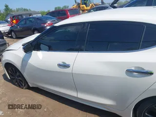 2017 Nissan Maxima SL with VIN 1N4AA6AP2HC411058, listed as a IAAI auction lot 42462494 with 107,341 mi miles and . Bid and sale history available at DreamBid. Image 14.