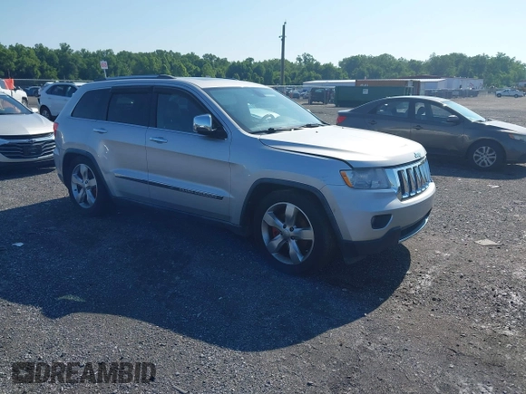 2011 Jeep Grand Cherokee Overland Summit with VIN 1J4RR6GT9BC535985, listed as a IAAI auction lot 42556913 with 108,845 mi miles and . Bid and sale history available at DreamBid. Image 1.