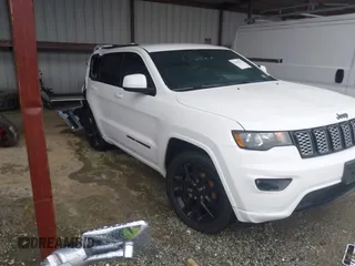 2018 Jeep Grand Cherokee Laredo with VIN 1C4RJFAG3JC499542, listed as a IAAI auction lot 41963731 with 92,791 mi miles and . Bid and sale history available at DreamBid. Image 1.