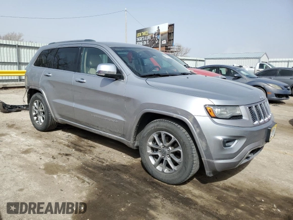 2014 Jeep Grand Cherokee Overland with VIN 1C4RJFCG4EC326325, listed as a Copart auction lot 49166645 with 128,261 mi miles and Salvage Title. Bid and sale history available at DreamBid. Image 4.