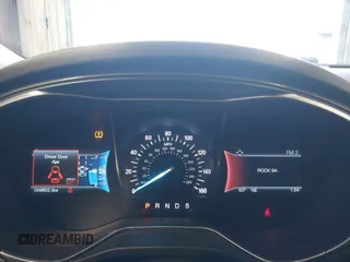 2016 Ford Fusion Titanium z VIN 3FA6P0D93GR116355, wystawiony jako IAAI lot #42158991 z przebiegiem 59 602 mil mil oraz . Historia ofert i sprzedaży dostępna na DreamBid. Obrazek 7.